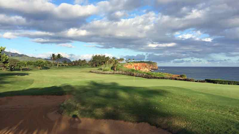 Poipu Bay with amazing clouds and color just prior to sunset