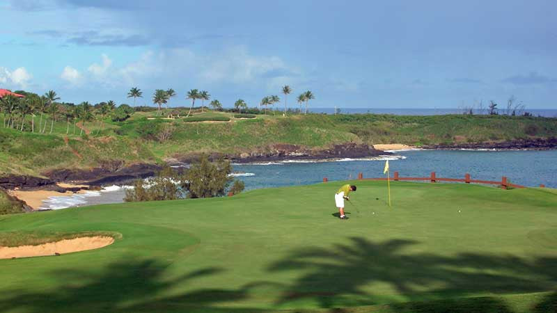 putting out on the 15th green at Kauai Lagoons