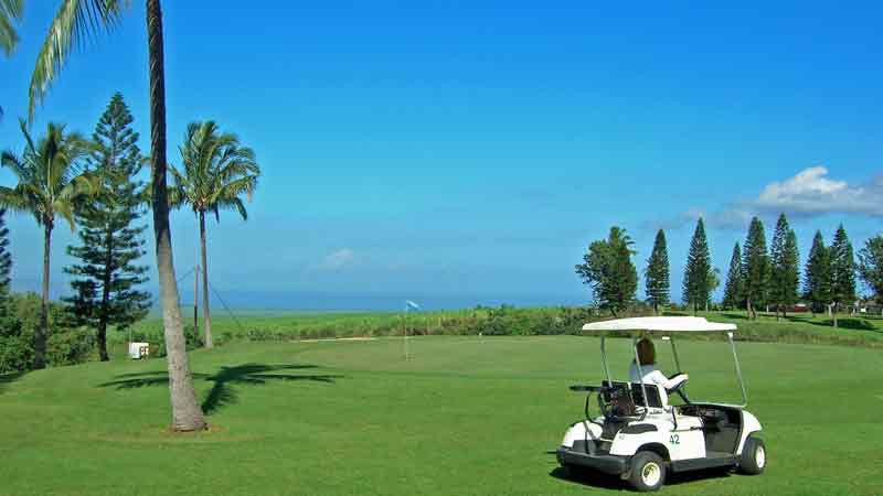 Pukalani Golf Course driving golf cart by second green